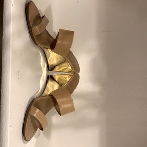 Super fun tan and mirrored gold wedges.